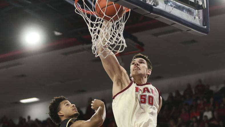 Jan 14, 2024; Boca Raton, Florida, USA; Florida Atlantic Owls center Vladislav Goldin (50) dunks the basketball against the UAB Blazers during the second half at Eleanor R. Baldwin Arena. Mandatory Credit: Sam Navarro-USA TODAY Sports