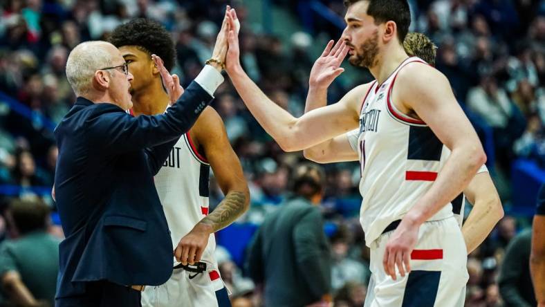 Jan 14, 2024; Hartford, Connecticut, USA; Connecticut Huskies head coach Dan Hurley reacts wi6h his players as they take on the Georgetown Hoyas at XL Center. Mandatory Credit: David Butler II-USA TODAY Sports