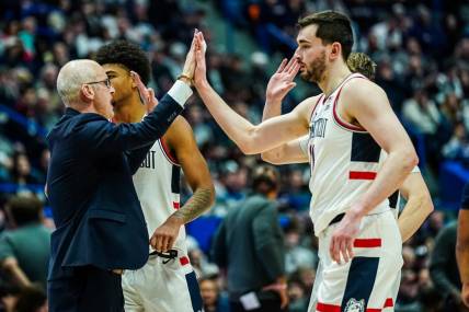 Jan 14, 2024; Hartford, Connecticut, USA; Connecticut Huskies head coach Dan Hurley reacts wi6h his players as they take on the Georgetown Hoyas at XL Center. Mandatory Credit: David Butler II-USA TODAY Sports