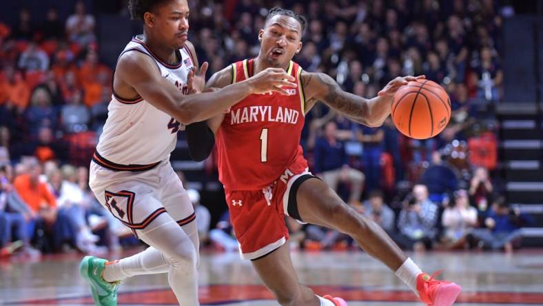 Jan 14, 2024; Champaign, Illinois, USA;  Maryland Terrapins guard Jahmir Young (1) drives the ball against Maryland Terrapins center Braden Pierce (4) during the second half at State Farm Center. Mandatory Credit: Ron Johnson-USA TODAY Sports