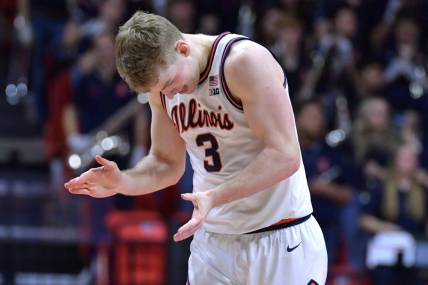 Jan 14, 2024; Champaign, Illinois, USA;  Illinois Fighting Illini guard Marcus Domask (3) slaps his hands after a turnover during the second half against the Maryland Terrapins at State Farm Center. Mandatory Credit: Ron Johnson-USA TODAY Sports