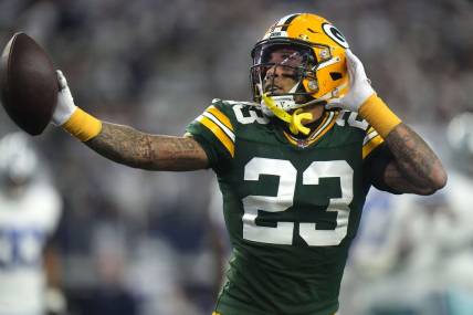 Jan 14, 2024; Arlington, Texas, USA; Green Bay Packers cornerback Jaire Alexander (23) reacts after intercepting a pass during the first quarter of the wild card playoff game against the Dallas Cowboys Sunday, January 14, 2024 at AT&T Stadium in Arlington, Texas. Mandatory Credit: Mark Hoffman-USA TODAY Sports