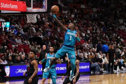 Jan 14, 2024; Miami, Florida, USA; Charlotte Hornets guard Terry Rozier (3) puts up a shot against the Miami Heat during the second half at Kaseya Center. Mandatory Credit: Jasen Vinlove-USA TODAY Sports