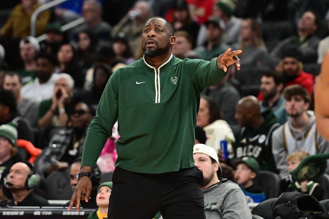 Jan 14, 2024; Milwaukee, Wisconsin, USA; Milwaukee Bucks head coach Adrian Griffin calls a play in the fourth quarter against the Sacramento Kings at Fiserv Forum. Mandatory Credit: Benny Sieu-USA TODAY Sports