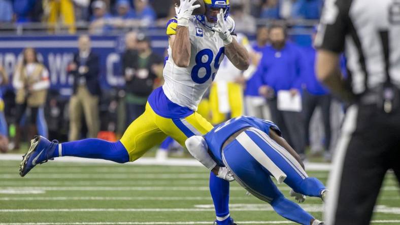 Jan 14, 2024; Detroit, Michigan, USA; Detroit Lions safety Kerby Joseph (31) breaks up a catch attempt by Los Angeles Rams tight end Tyler Higbee (89) during the second half of a 2024 NFC wild card game at Ford Field. Mandatory Credit: David Reginek-USA TODAY Sports