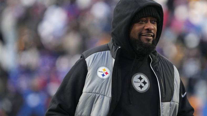 Jan 15, 2024; Orchard Park, New York, USA; Pittsburgh Steelers head coach Mike Tomlin walks the field before the game against the Buffalo Bills in a 2024 AFC wild card game at Highmark Stadium. Mandatory Credit: Kirby Lee-USA TODAY Sports