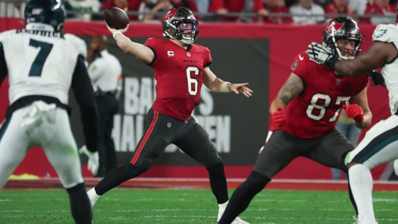 Jan 15, 2024; Tampa, Florida, USA; Tampa Bay Buccaneers quarterback Baker Mayfield (6) throws against the Philadelphia Eagles during the first half of a 2024 NFC wild card game at Raymond James Stadium. Mandatory Credit: Kim Klement Neitzel-USA TODAY Sports