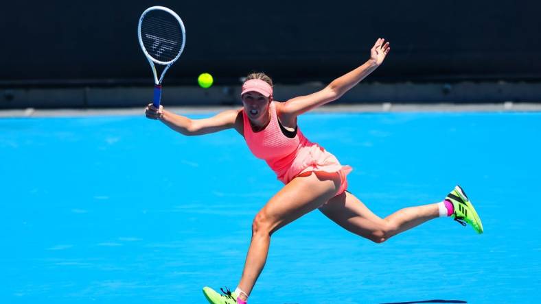 Jan 16, 2024; Melbourne, Victoria, Australia; Danielle Collins of the United States plays a shot against Angelique Kerber (not pictured) of Germany in Round 1 of the Women's Singles on Day 3 of the Australian Open tennis at Rod Laver Arena. Mandatory Credit: Mike Frey-USA TODAY Sports