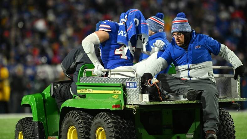 Jan 15, 2024; Orchard Park, New York, USA; Buffalo Bills linebacker Terrel Bernard (43) is carted off the field after an apparent injury against the Pittsburgh Steelers in a 2024 AFC wild card game at Highmark Stadium. Mandatory Credit: Mark Konezny-USA TODAY Sports