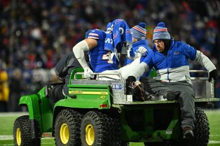 Jan 15, 2024; Orchard Park, New York, USA; Buffalo Bills linebacker Terrel Bernard (43) is carted off the field after an apparent injury against the Pittsburgh Steelers in a 2024 AFC wild card game at Highmark Stadium. Mandatory Credit: Mark Konezny-USA TODAY Sports