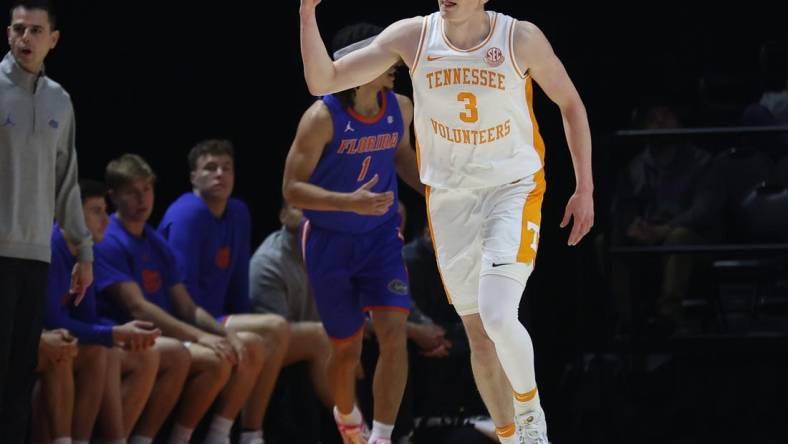 Jan 16, 2024; Knoxville, Tennessee, USA; Tennessee Volunteers guard Dalton Knecht (3) reacts after shooting a three pointer against the Florida Gators during the first half at Thompson-Boling Arena at Food City Center. Mandatory Credit: Randy Sartin-USA TODAY Sports