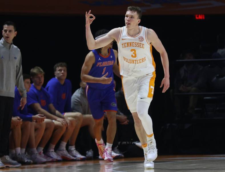 Jan 16, 2024; Knoxville, Tennessee, USA; Tennessee Volunteers guard Dalton Knecht (3) reacts after shooting a three pointer against the Florida Gators during the first half at Thompson-Boling Arena at Food City Center. Mandatory Credit: Randy Sartin-USA TODAY Sports