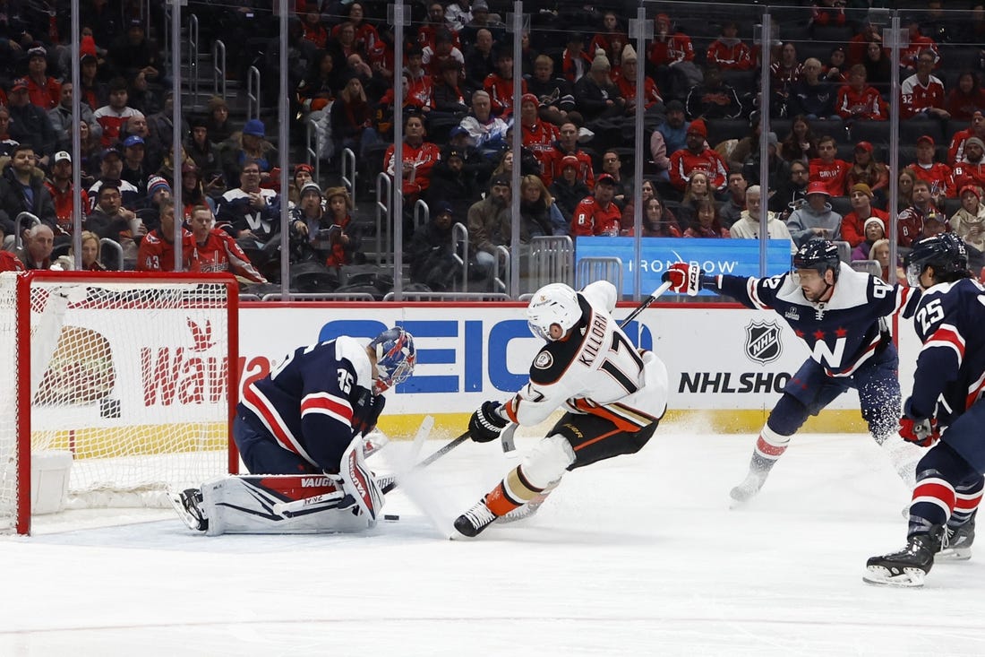 Jan 16, 2024; Washington, District of Columbia, USA; Anaheim Ducks left wing Alex Killorn (17) skates in on Washington Capitals goaltender Darcy Kuemper (35) as Capitals center Evgeny Kuznetsov (92) defends in the second period at Capital One Arena. Mandatory Credit: Geoff Burke-USA TODAY Sports