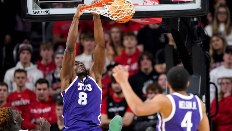 TCU Horned Frogs center Ernest Udeh Jr. (8) dunks in the second half of a college basketball game between the TCU Horned Frogs and the Cincinnati Bearcats, Tuesday, Jan. 16, 2024, at Fifth Third Arena in Cincinnati. The Cincinnati Bearcats won, 81-77.