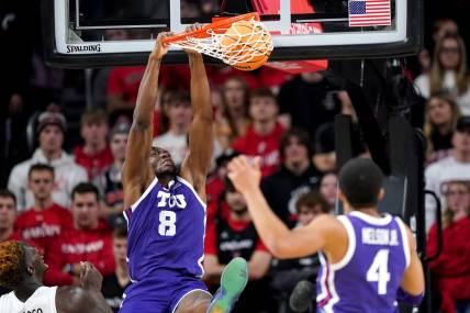 TCU Horned Frogs center Ernest Udeh Jr. (8) dunks in the second half of a college basketball game between the TCU Horned Frogs and the Cincinnati Bearcats, Tuesday, Jan. 16, 2024, at Fifth Third Arena in Cincinnati. The Cincinnati Bearcats won, 81-77.