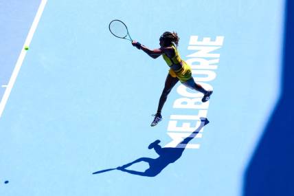 Jan 17, 2024; Melbourne, Victoria, Australia; Coco Gauff of the United States plays a shot against Caroline Dolehide (not pictured) also of the United States in Round 2 of the Women's Singles on Day 4 of the Australian Open tennis at Margaret Court Arena. Mandatory Credit: Mike Frey-USA TODAY Sports