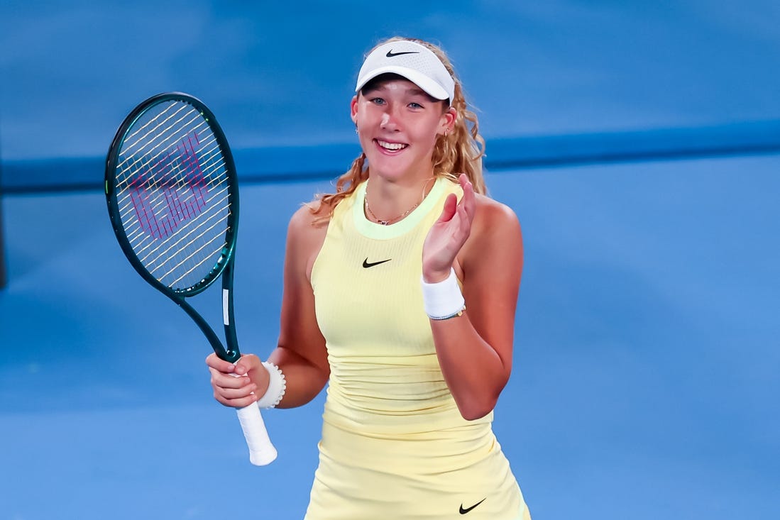 17 Jan, 2024; Melbourne, Victoria, Australia; Mirra Andreeva of Russia celebrates her win against Ons Jabeur (not pictured) of Tunisia in Round 2 of the Women's Singles on Day 4 of the Australian Open tennis at Rod Laver Arena. Mandatory Credit: Mike Frey-USA TODAY Sports