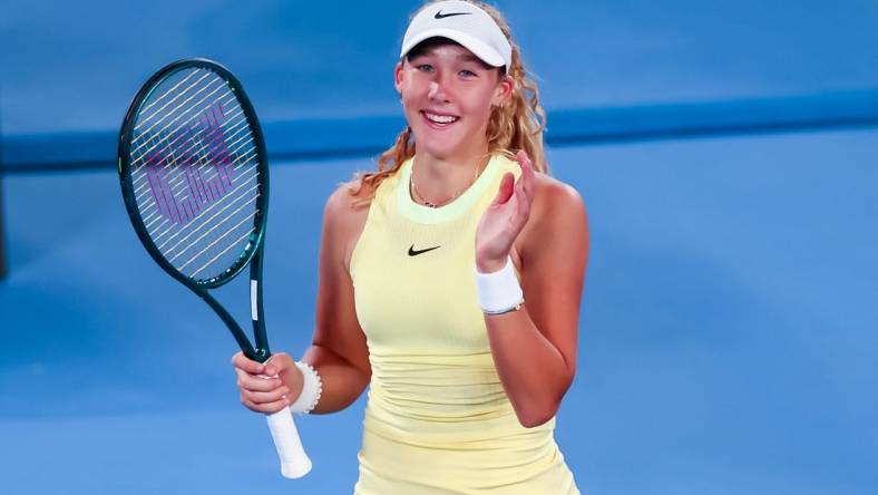 17 Jan, 2024; Melbourne, Victoria, Australia; Mirra Andreeva of Russia celebrates her win against Ons Jabeur (not pictured) of Tunisia in Round 2 of the Women's Singles on Day 4 of the Australian Open tennis at Rod Laver Arena. Mandatory Credit: Mike Frey-USA TODAY Sports