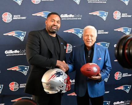 Jan 17, 2024; Foxborough, MA, USA; New England Patriots head coach Jerod Mayo (L) and owner Robert Kraft pose for photos after a press conference announcing Mayo's hiring as the team's head coach at Gillette Stadium. Mandatory Credit: Eric Canha-USA TODAY Sports
