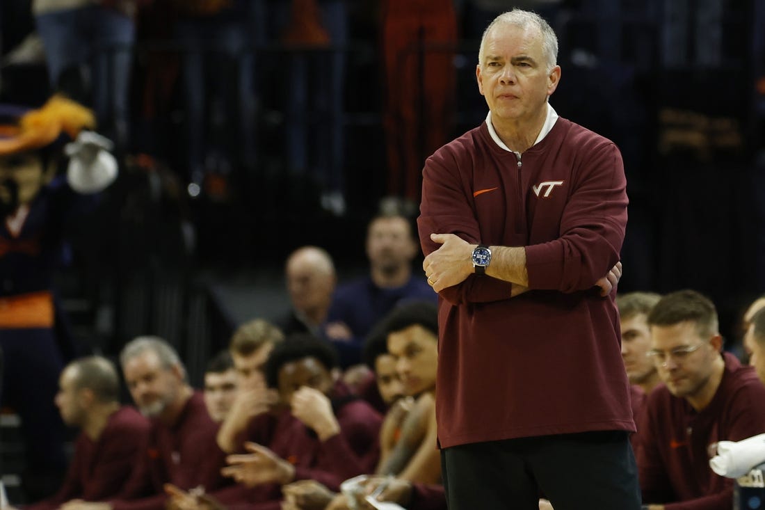 Jan 17, 2024; Charlottesville, Virginia, USA; Virginia Tech Hokies head coach Mike Young looks on from the bench against the Virginia Cavaliers in the second half at John Paul Jones Arena. Mandatory Credit: Geoff Burke-USA TODAY Sports