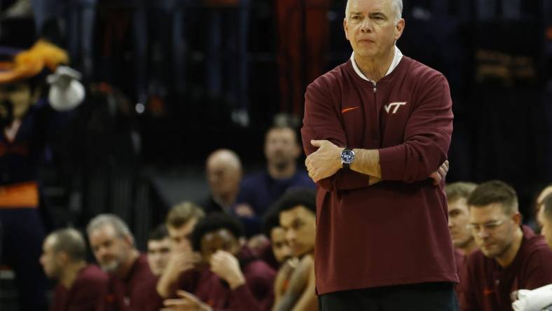Jan 17, 2024; Charlottesville, Virginia, USA; Virginia Tech Hokies head coach Mike Young looks on from the bench against the Virginia Cavaliers in the second half at John Paul Jones Arena. Mandatory Credit: Geoff Burke-USA TODAY Sports