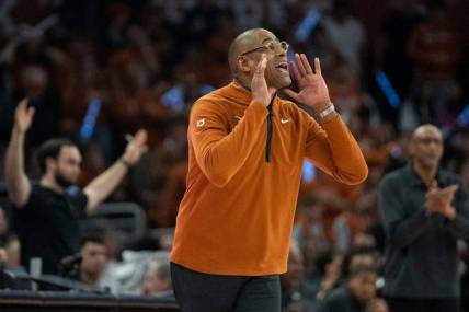 Texas Longhorns head coach Rodney Terry yells instructions to his team during the game against University of Central Florida at the Moody center in Austin, Texas Wednesday, Jan. 17, 2023.