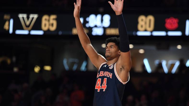 Jan 17, 2024; Nashville, Tennessee, USA; Auburn Tigers center Dylan Cardwell (44) celebrates in the closing seconds of the second half of a win against the Vanderbilt Commodores at Memorial Gymnasium. Mandatory Credit: Christopher Hanewinckel-USA TODAY Sports