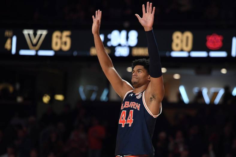 Jan 17, 2024; Nashville, Tennessee, USA; Auburn Tigers center Dylan Cardwell (44) celebrates in the closing seconds of the second half of a win against the Vanderbilt Commodores at Memorial Gymnasium. Mandatory Credit: Christopher Hanewinckel-USA TODAY Sports