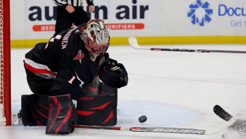 Jan 18, 2024; Buffalo, New York, USA;  Buffalo Sabres goaltender Ukko-Pekka Luukkonen (1) makes a save during the third period against the Chicago Blackhawks at KeyBank Center. Mandatory Credit: Timothy T. Ludwig-USA TODAY Sports