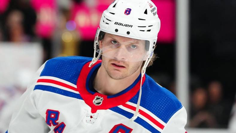 Jan 18, 2024; Las Vegas, Nevada, USA; New York Rangers defenseman Jacob Trouba (8) warms up before a game against the Vegas Golden Knights at T-Mobile Arena. Mandatory Credit: Stephen R. Sylvanie-USA TODAY Sports