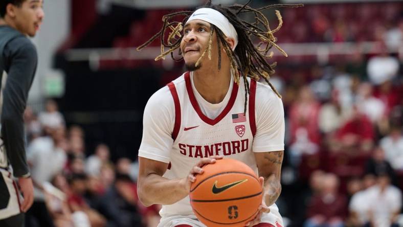 Jan 18, 2024; Stanford, California, USA; Stanford Cardinal guard Kanaan Carlyle (3) dribbles the ball against the Washington State Cougars during the first half at Maples Pavilion. Mandatory Credit: Robert Edwards-USA TODAY Sports