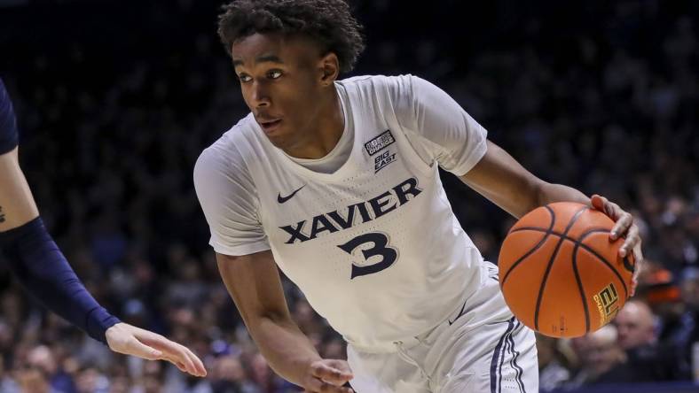 Jan 19, 2024; Cincinnati, Ohio, USA; Xavier Musketeers guard Dailyn Swain (3) dribbles against the Georgetown Hoyas in the first half at Cintas Center. Mandatory Credit: Katie Stratman-USA TODAY Sports