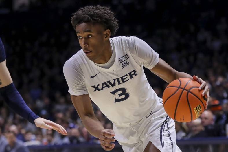 Jan 19, 2024; Cincinnati, Ohio, USA; Xavier Musketeers guard Dailyn Swain (3) dribbles against the Georgetown Hoyas in the first half at Cintas Center. Mandatory Credit: Katie Stratman-USA TODAY Sports