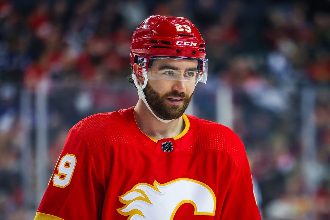 Jan 18, 2024; Calgary, Alberta, CAN; Calgary Flames center Dillon Dube (29) against the Toronto Maple Leafs during the first period at Scotiabank Saddledome. Mandatory Credit: Sergei Belski-USA TODAY Sports