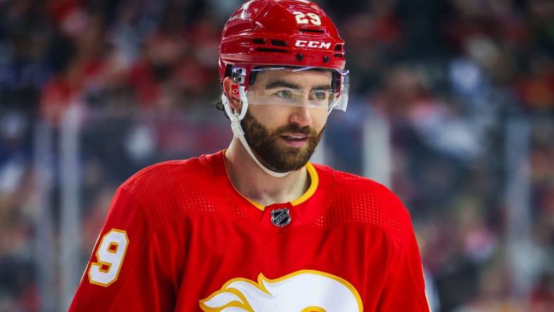 Jan 18, 2024; Calgary, Alberta, CAN; Calgary Flames center Dillon Dube (29) against the Toronto Maple Leafs during the first period at Scotiabank Saddledome. Mandatory Credit: Sergei Belski-USA TODAY Sports