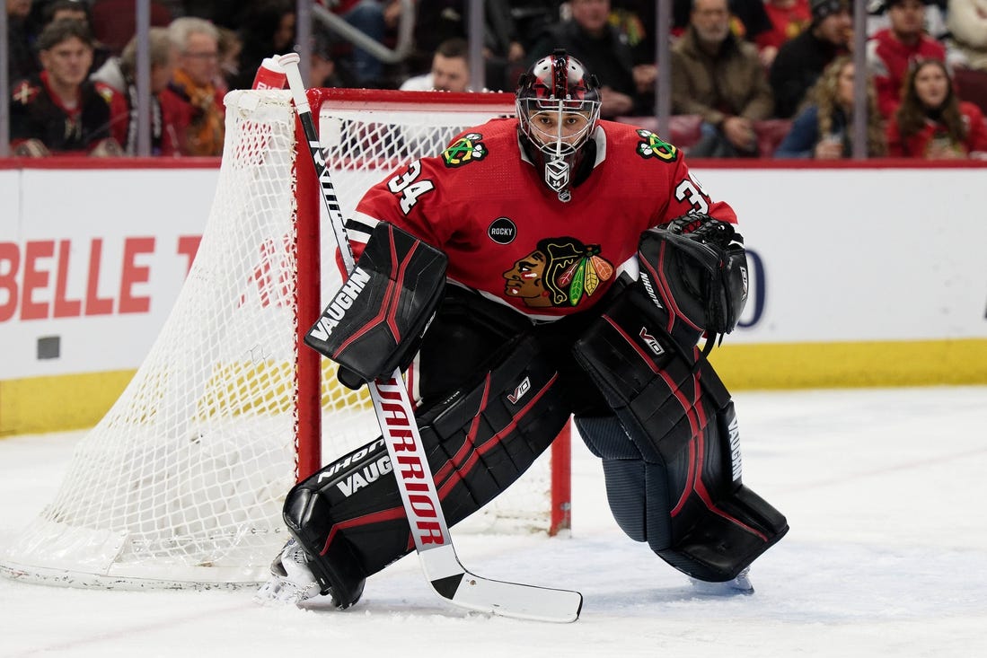 Jan 13, 2024; Chicago, Illinois, USA;  Chicago Blackhawks goaltender Petr Mrazek (34) defends the net against the Dallas Stars at United Center. Mandatory Credit: Jamie Sabau-USA TODAY Sports