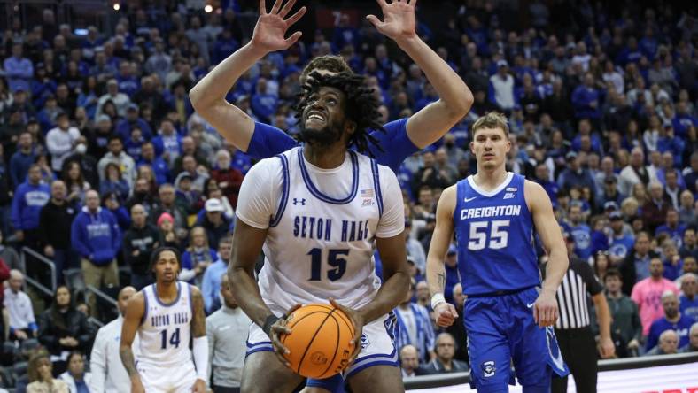 Jan 20, 2024; Newark, New Jersey, USA; Seton Hall Pirates center Jaden Bediako (15) looks to shoot as Creighton Bluejays center Ryan Kalkbrenner (11) defends during the second half at Prudential Center. Mandatory Credit: Vincent Carchietta-USA TODAY Sports