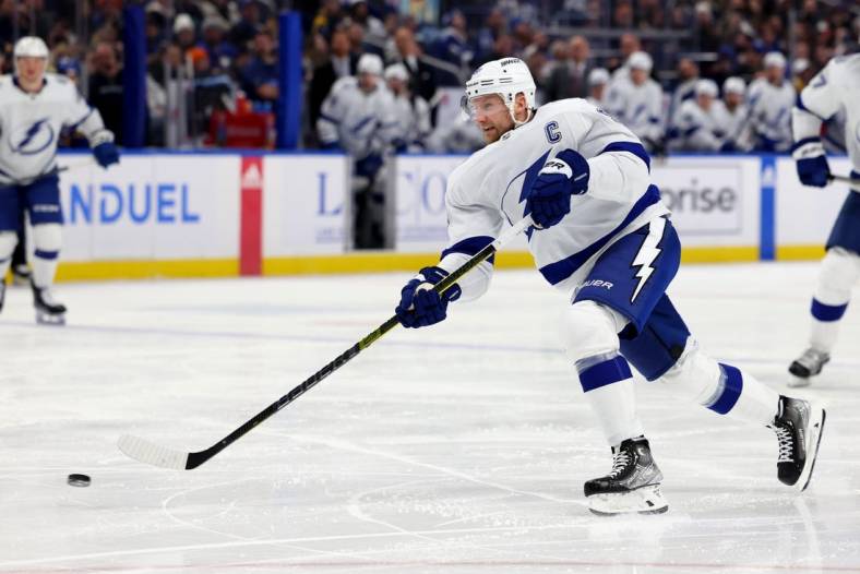 Jan 20, 2024; Buffalo, New York, USA;  Tampa Bay Lightning center Steven Stamkos (91) takes a shot on goal during the third period against the Buffalo Sabres at KeyBank Center. Mandatory Credit: Timothy T. Ludwig-USA TODAY Sports
