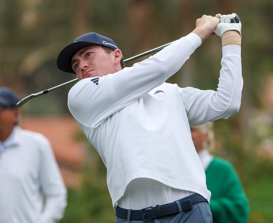 Amateur Nick Dunlap tees off on the 12th hole at La Quinta Country Club during the third round of the American Express golf tournament in La Quinta, Calif., Jan. 20, 2024.