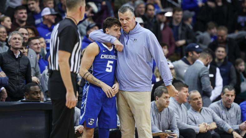 Jan 20, 2024; Newark, New Jersey, USA; Creighton Bluejays head coach Greg McDermott talks with guard Francisco Farabello (5) during triple overtime against the Seton Hall Pirates at Prudential Center. Mandatory Credit: Vincent Carchietta-USA TODAY Sports