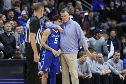 Jan 20, 2024; Newark, New Jersey, USA; Creighton Bluejays head coach Greg McDermott talks with guard Francisco Farabello (5) during triple overtime against the Seton Hall Pirates at Prudential Center. Mandatory Credit: Vincent Carchietta-USA TODAY Sports