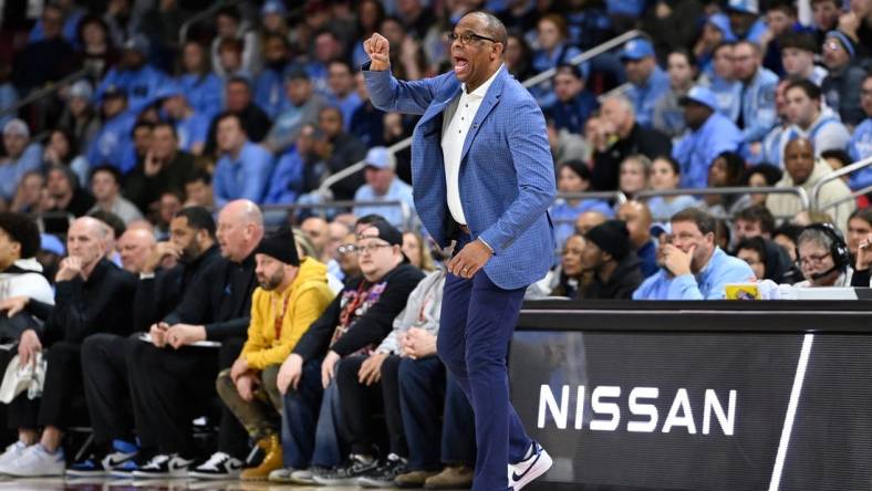 Jan 20, 2024; Chestnut Hill, Massachusetts, USA; North Carolina Tar Heels head coach Hubert Davis reacts to game action against the Boston College Eagles during the second half at Conte Forum. Mandatory Credit: Eric Canha-USA TODAY Sports