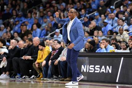Jan 20, 2024; Chestnut Hill, Massachusetts, USA; North Carolina Tar Heels head coach Hubert Davis reacts to game action against the Boston College Eagles during the second half at Conte Forum. Mandatory Credit: Eric Canha-USA TODAY Sports