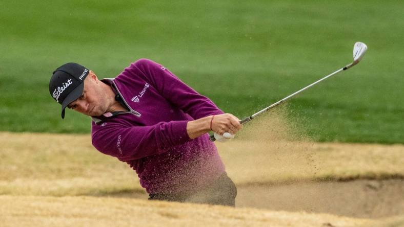 Justin Thomas hits out of a bunker on his approach to the 18th green of the Pete Dye Stadium Course during Round 3 of The American Express at PGA West in La Quinta, Calif., Saturday, Jan. 20, 2024.