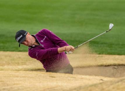 Justin Thomas hits out of a bunker on his approach to the 18th green of the Pete Dye Stadium Course during Round 3 of The American Express at PGA West in La Quinta, Calif., Saturday, Jan. 20, 2024.
