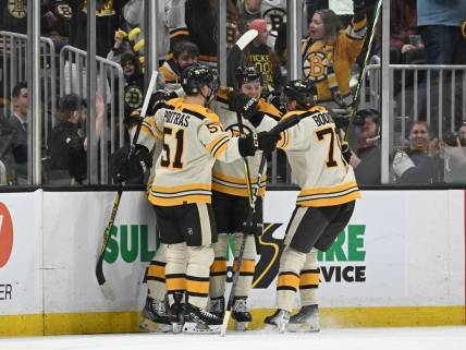 Jan 20, 2024; Boston, Massachusetts, USA; Boston Bruins left wing Danton Heinen (43) celebrates with his teammates after a goal against the Montreal Canadiens during the second period at the TD Garden. Mandatory Credit: Brian Fluharty-USA TODAY Sports