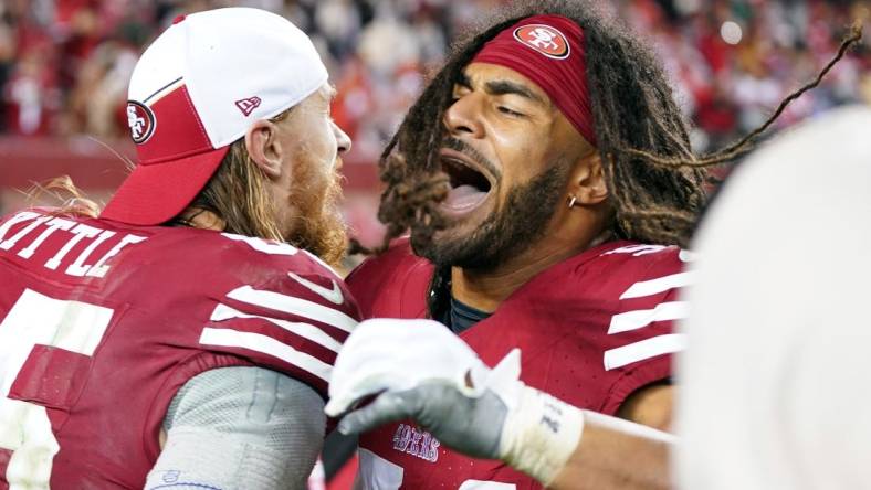 January 20, 2024; Santa Clara, CA, USA; San Francisco 49ers tight end George Kittle (85) and linebacker Fred Warner (54) celebrate after defeating the Green Bay Packers in a 2024 NFC divisional round game at Levi's Stadium. Mandatory Credit: Kyle Terada-USA TODAY Sports