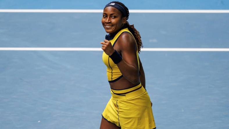 Jan 21, 2024; Melbourne, Victoria, Australia;   Coco Gauff of the United States celebrates her victory over Magdalena Frech of Poland in the fourth round of the women s singles at the Australian Open 2024. Mandatory Credit: Mike Frey-USA TODAY Sports