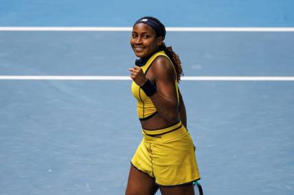 Jan 21, 2024; Melbourne, Victoria, Australia;   Coco Gauff of the United States celebrates her victory over Magdalena Frech of Poland in the fourth round of the women s singles at the Australian Open 2024. Mandatory Credit: Mike Frey-USA TODAY Sports