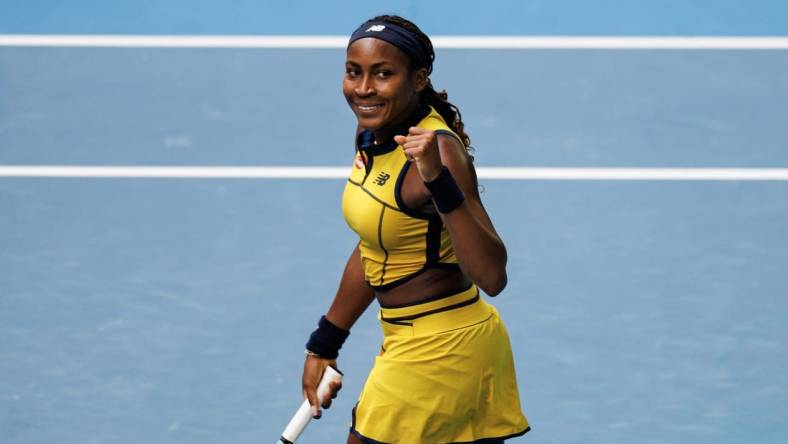 Jan 21, 2024; Melbourne, Victoria, Australia;   Coco Gauff of the United States celebrates her victory over Magdalena Frech of Poland in the fourth round of the women s singles at the Australian Open 2024. Mandatory Credit: Mike Frey-USA TODAY Sports